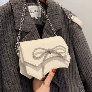 Túi xách nữ kẹp nách đeo chéo nơ kim tuyến dây đeo bạc sz20 K74