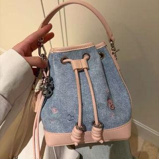 Túi xách nữ, đeo chéo đeo vai dáng chậu dây rút da in 2 dây tặng kèm móc treo cún dễ thương K739