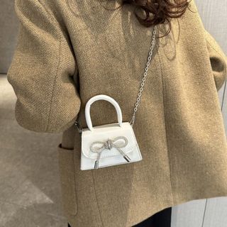 Túi xách nữ kẹp nách đeo chéo da trơn gắn nơ kim tuyến có quai xách K301