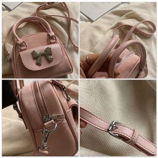 Túi xách nữ kẹp nách đeo chéo hai quai dáng bầu đính nơ bạc K462