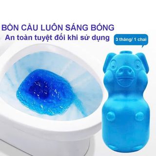 Chai thả bồn cầu hình heo cute ( có hộp )