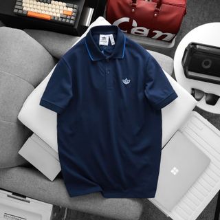 Mẫu áo  thun polo nam thiết kế đơn giản. Phối màu tinh tế của logo và cổ áo. Logo thêu tỉ mỉ