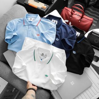 Mẫu áo  thun polo nam thiết kế đơn giản. Phối màu tinh tế của logo và cổ áo. Logo thêu tỉ mỉ