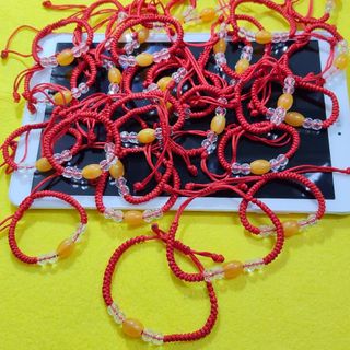Vòng tay dây rút mẫu mặt màu cam