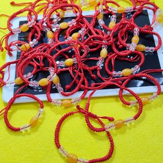 Vòng tay dây rút mẫu mặt màu cam
