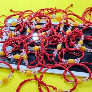 Vòng tay dây rút mẫu mặt màu cam
