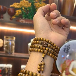 Vòng đeo tay gỗ bách xanh mix sen giá sỉ