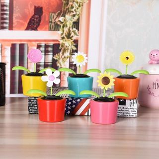 Đồ trang trí ô tô chậu hoa hướng dương lắc lư sử dụng năng lượng mặt trời trang trí taplo ô tô