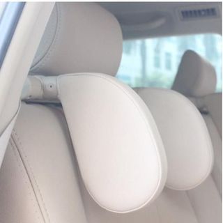 Gối tựa đầu 2 bên bọc da cao cấp có chế độ xoay tuỳ chỉnh 180 độ