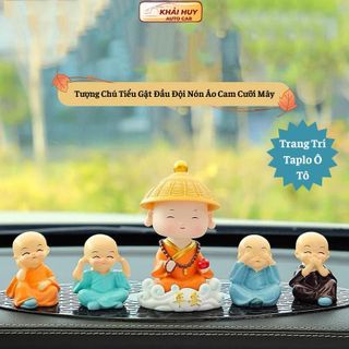 Tượng Chú Tiểu Gật Đầu Đội Nón Áo Cam Cưỡi Mây Trang Trí Taplo Ô Tô khaihuyauto