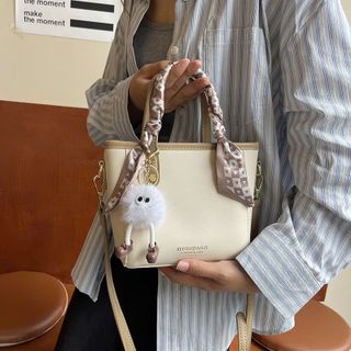 Túi xách nữ, túi đeo chéo kèm gấu xinh xắn K571