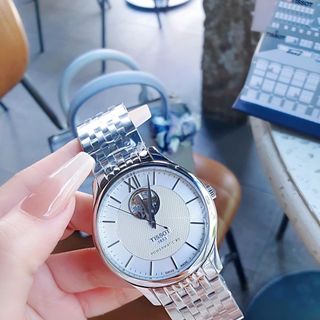 ĐỒNG HỒ NAM CƠ THUỴ SỸ TISOC DÂY THÉP KÍNH SAPHIRE LỘ MÁY MÀU BẠC