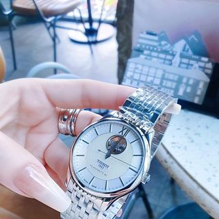 ĐỒNG HỒ NAM CƠ THUỴ SỸ TISOC DÂY THÉP KÍNH SAPHIRE LỘ MÁY MÀU BẠC