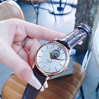 ĐỒNG HỒ NAM CƠ THUỴ SỸ TISOC DÂY DA KÍNH SAPHIRE LỘ MÁY MẶT TRẮNG VIỀN ĐỒNG