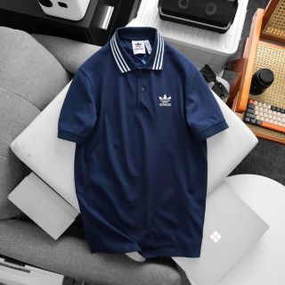 Mẫu áo cổ bẻ thể thao thiết kế bo sọc kết hợp Logo thêu chuẩn hãng. Chất vải cá sấu cotton mềm mướt.