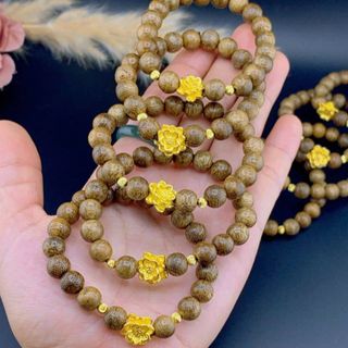 Vòng trầm hương mix sen vàng giá sỉ