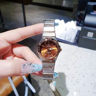 XẢ KHO ĐỒNG HỒ NAM NỮ TRUNG CẤP OMAGE VIỀN BEZEL KHOÁ BƯỚM