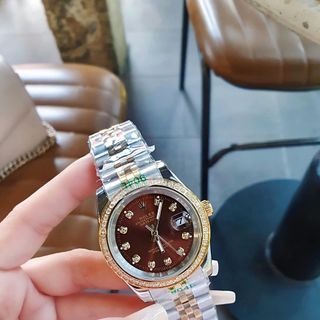 ĐỒNG HỒ NAM NỮ CAO CẤP ROLXE DÂY THÉP DEMI VÀNG MẶT NÂU KÍNH SAPHIRE VIỀN HỘT