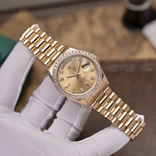 ĐỒNG HỒ CAO CẤP ROLXE DAY DATE DÂY THÉP VÀNG VIỀN ĐÁ FREESTYLE