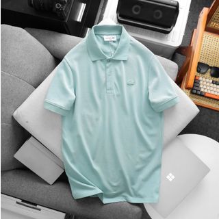 Polo cá sấu trơn nam.  Logo cao su đồng màu áo.