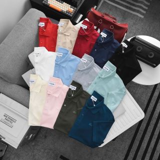 Polo cá sấu trơn nam.  Logo cao su đồng màu áo.