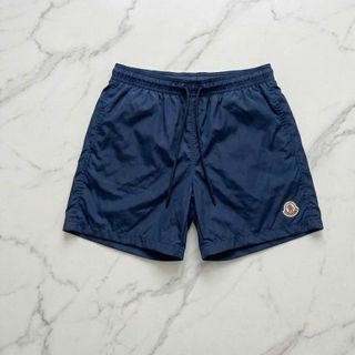 Short Moncler 2 lớp.  Chất dù trơn lót lưới, Logo may chắc chắc.
