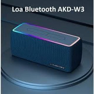 Loa Bluetooth AKD-W3 màu đỏ, nổi bật với thiết kế bọc vải và dải đèn LED RGB đổi màu xung quanh viền.