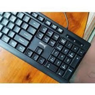 Combo bàn phím có dây DEIOG DY-818 màu đen, nổi bật với thiết kế khay đựng bút tiện lợi ở phía trên.