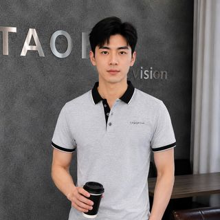 áo xám thêu chữ ký