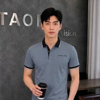 áo xám chì thêu chữ ký