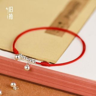 Vòng tay chỉ đỏ chuông bạc tình duyên thu hút may mắn thiết kế độc đáo màu đỏ ngũ sắc mang lại tình duyên và may mắn cho người sử dụng sản phẩm