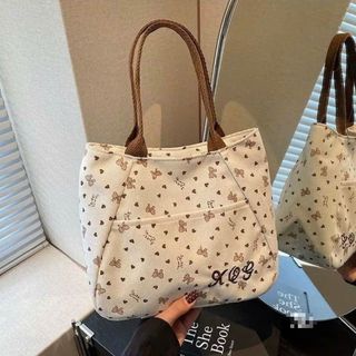 🎀TÚI XÁCH TAY NỮ XQG IN NƠ XINH XẮN – NHỎ GỌN, DỄ PHỐI ĐỒ