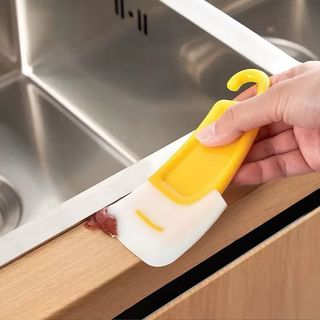 Dụng cụ vệ sinh nồi chống dính,có đáy phẳng, dùng để cạo thức ăn thừa trên chảo