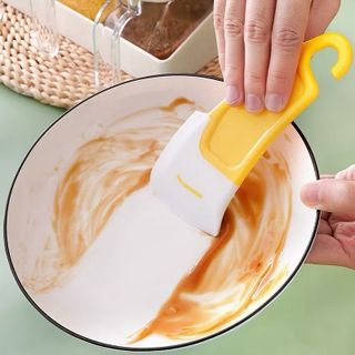 Dụng cụ vệ sinh nồi chống dính,có đáy phẳng, dùng để cạo thức ăn thừa trên chảo