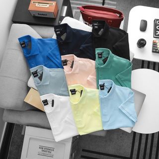 Áo thun polo nam. Chất cotton pique mềm mịn, logo thêu đơn giản, tỉ mỉ.