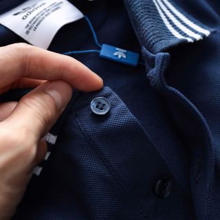 Mẫu áo cổ bẻ thể thao thiết kế bo sọc. Chất vải cá sấu cotton mềm mướt.