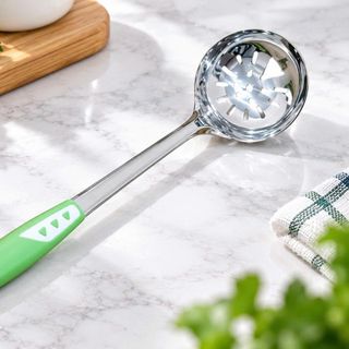 VÁ LỖ MÚC CANH INOX CÁN NHỰA XANH (T200)