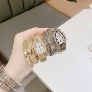 Đồng hồ nữ mặt bầu đính đá, dây kim loại dạng rắn 2 màu vàng - bạc Gossie Rắn