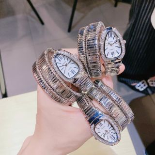 Đồng hồ nữ mặt bầu đính đá, dây kim loại dạng rắn 2 màu vàng - bạc Gossie Rắn
