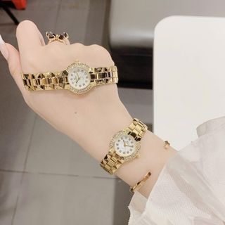 Đồng hồ nữ mặt tròn đính đá, dây kim loại vàng sang trọng BS Mác