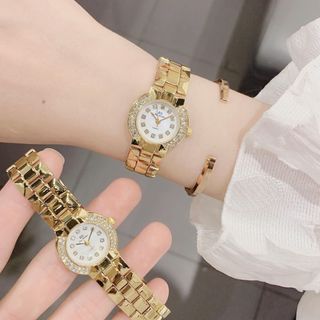 Đồng hồ nữ mặt tròn đính đá, dây kim loại vàng sang trọng BS Mác