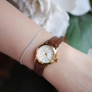 Đồng hồ nữ mặt tròn viền vàng, dây da đen thanh lịch HALEI Da Nhỏ