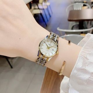 Đồng hồ nữ mặt tròn, dây kim loại 2 màu trắng - demi HALEI 562