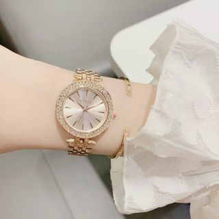 Đồng hồ nữ mặt tròn đính đá, dây kim loại 2 màu trắng - vàng hồng Gossie MK