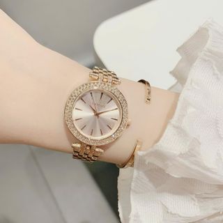 Đồng hồ nữ mặt tròn đính đá, dây kim loại 2 màu trắng - vàng hồng Gossie MK
