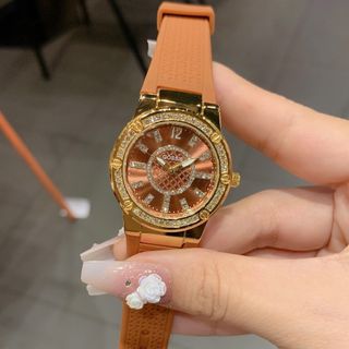 Đồng hồ nữ mặt tròn đính đá, dây cao su cam đất Gossie Cam Đất