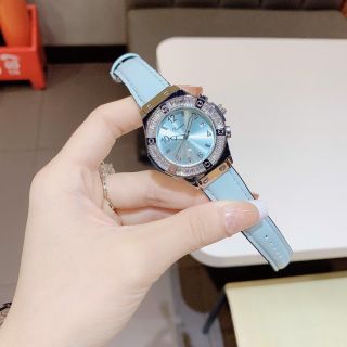 Đồng hồ nữ mặt tròn đính đá, dây da xanh thanh lịch Dimini Xanh Nền Trơn