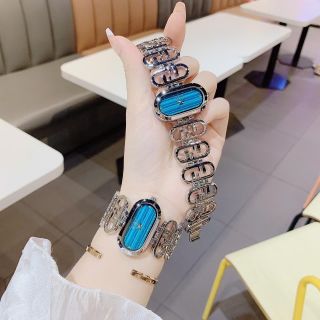 Đồng hồ nữ mặt oval, dây lắc chữ F 2 màu vàng - bạc Gossie Lắc F