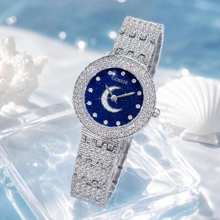Đồng hồ nữ mặt tròn xanh trăng sao đính đá, dây kim loại bạc Gossie Trăng Sao