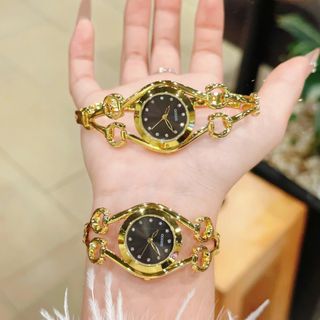 Đồng hồ nữ lắc tay mặt tròn, thiết kế mắt GU 3 màu trắng - vàng - vàng đen Gossie Lắc GU